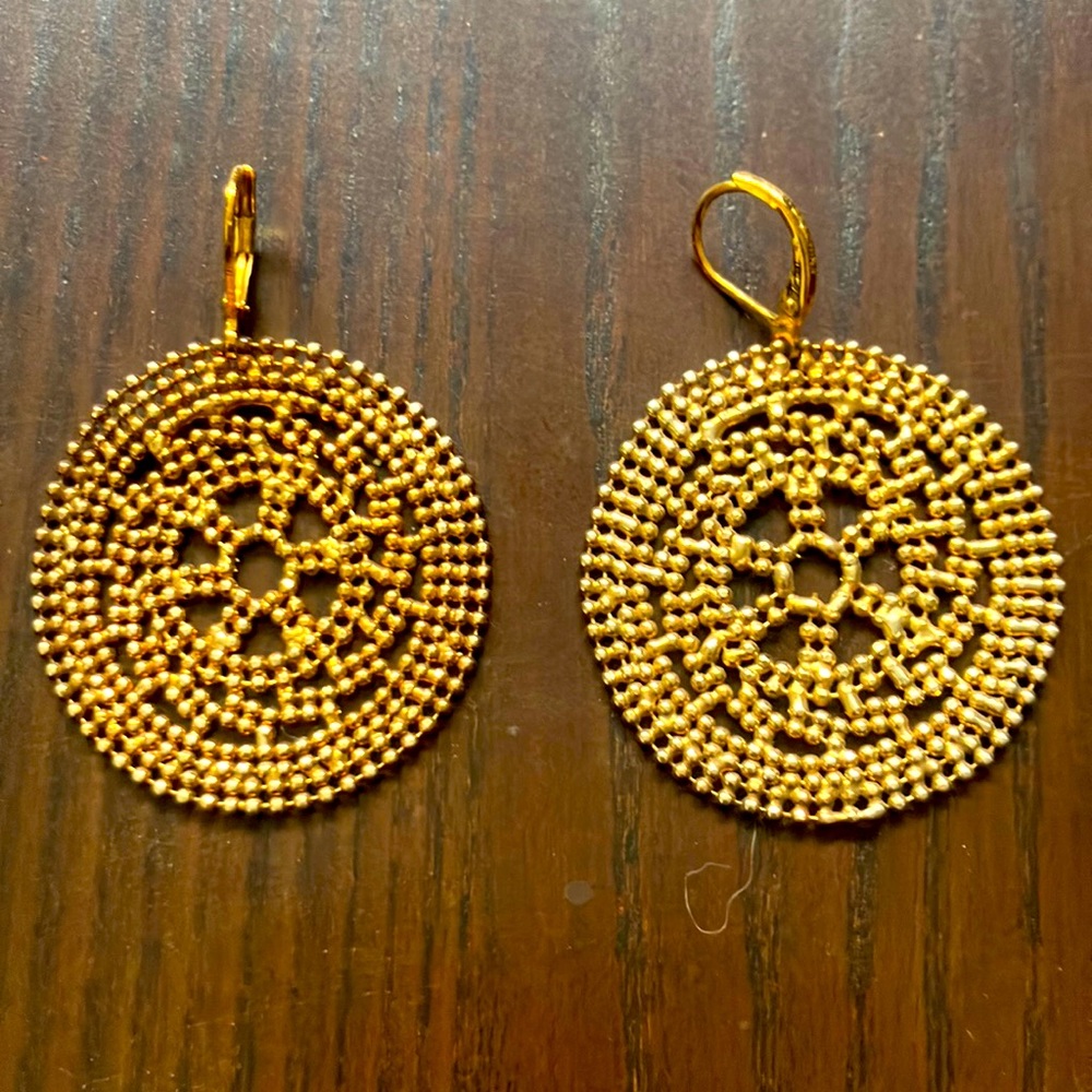Joan Rivers gold colored earrings